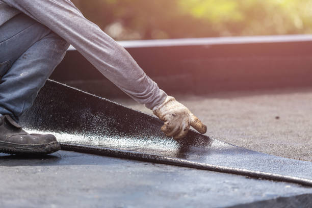 Professional Basement Waterproofing technician working in Montville, NJ